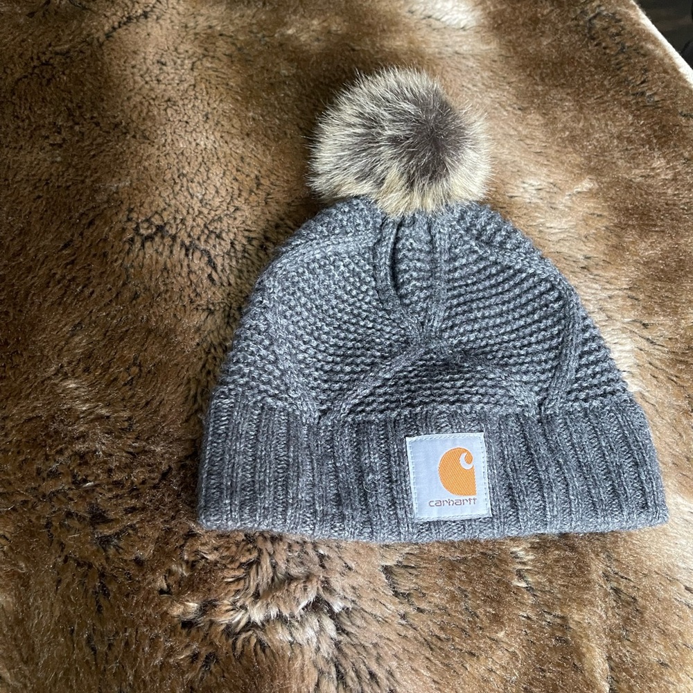 Carhartt women’s beanie with furry pom-pom